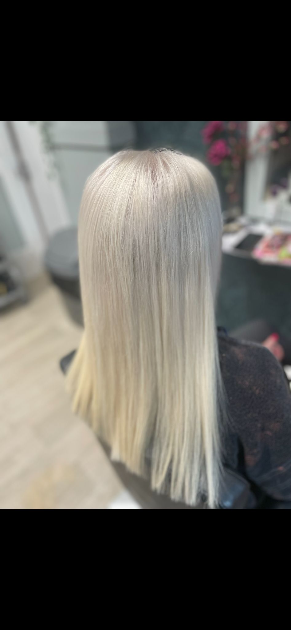 Client with sleek, icy blonde hair